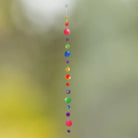 Muschelkette Multicolor aus Capiz-Muscheln, farbenfrohes Lichtspiel für harmonische Deko.