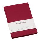 Bordeauxrotes Semikolon Notizbuch A5 mit Leinenumschlag und Banderole, liniert.