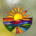 Kunstvolles Fensterbild Sonnenaufgang aus transparentem Acryl, leuchtende Farben für warme, lebendige Stimmung im Raum.