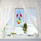Kleiner Regenbogen Traumfänger am Fenster, 6cm Durchmesser, ideal als Glücksbringer.