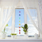 Chakra Muschelkette am Fenster, 80cm lang, ideal für Meditationsplatz oder Deko.