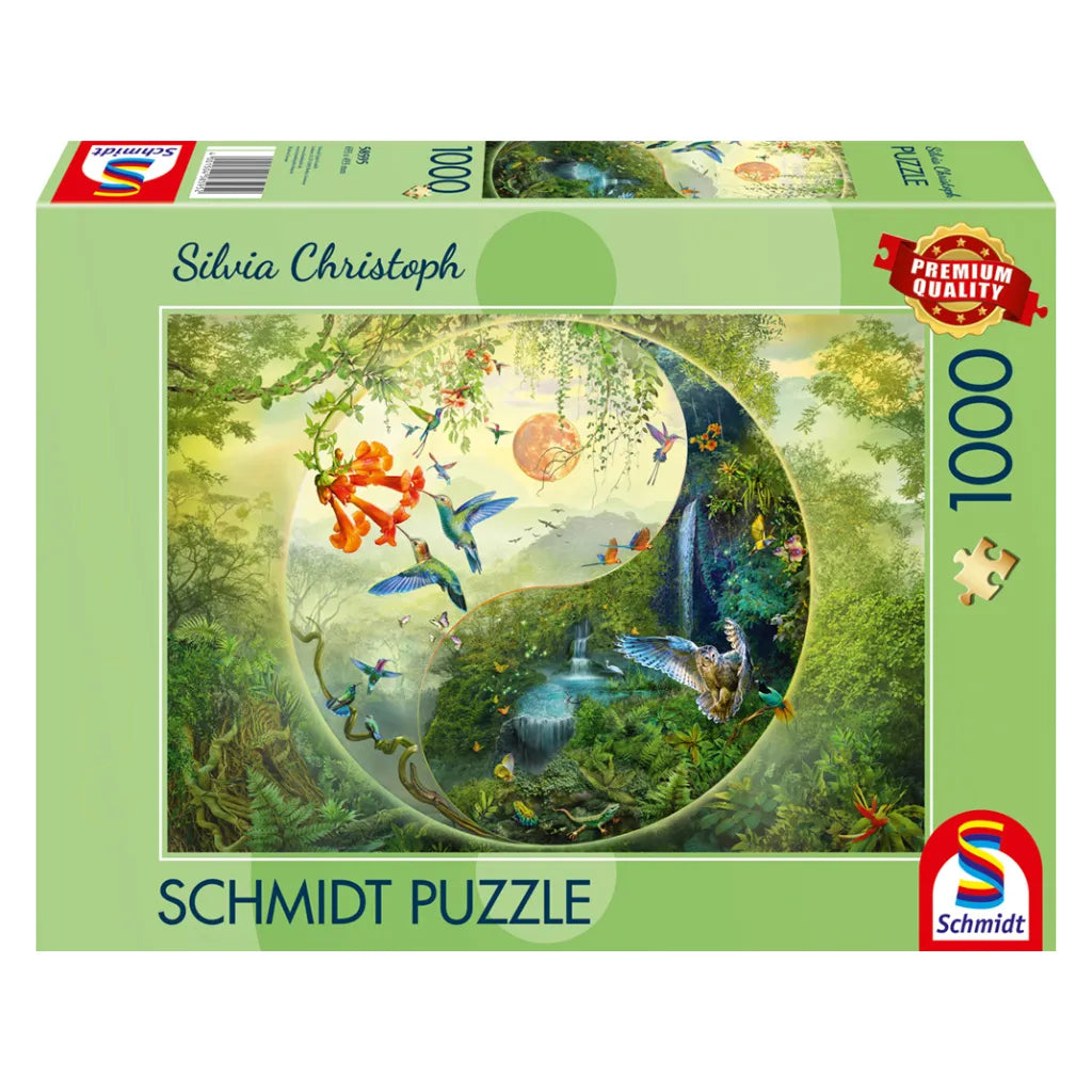 Schmidt Puzzle 1000 Teile "Im Wald der Kolibris" von Silvia Christoph. Produktverpackung mit faszinierendem Dschungelmotiv im Yin-Yang-Design, vielen Kolibris und Wasserfall.